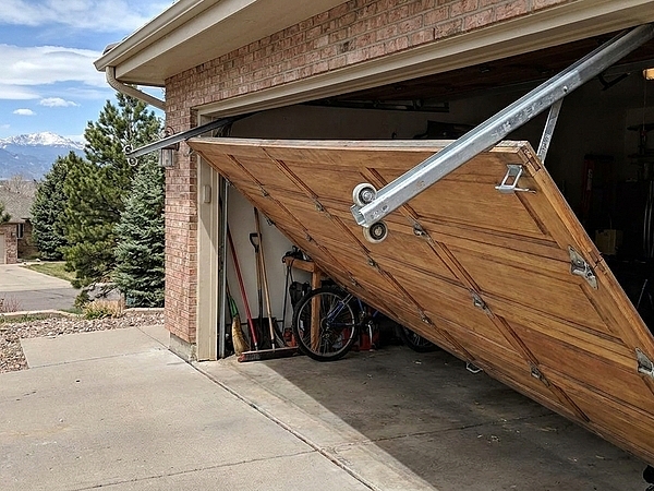 Why Does Your Garage Door in Dallas-Fort Worth Keep Coming Off Track?