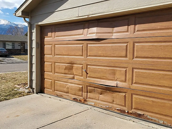 Common Garage Door Panel Damage We See in Denver Homes